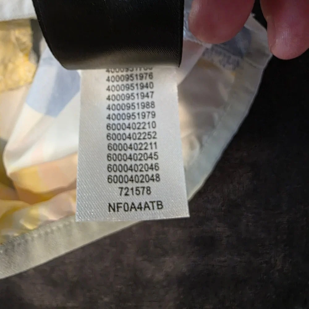 The North Face Youth Windwall Anorak Jacket White Abstract Print NF0A4ATB S 7/8